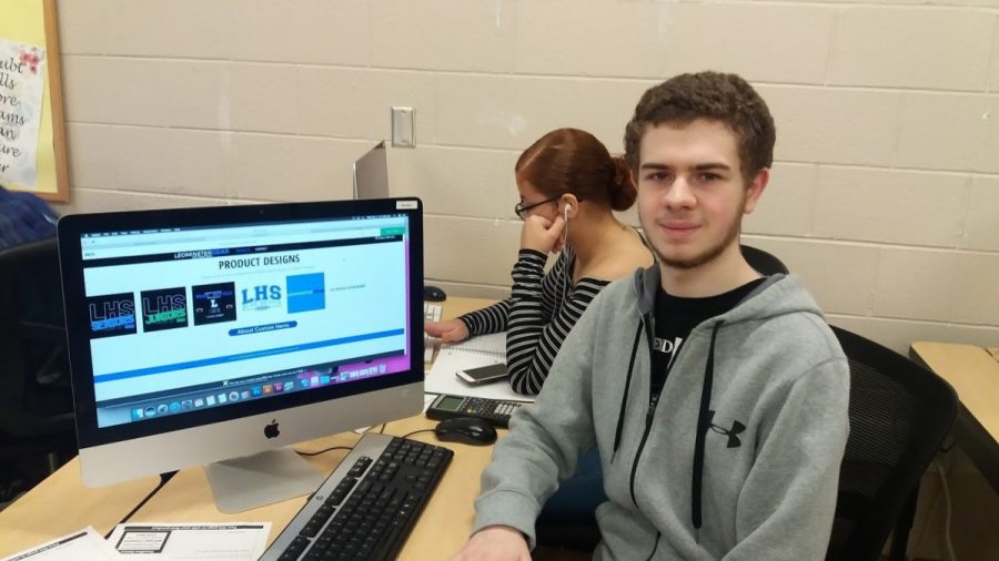 LHS Junior Max Campbell shows off the upcoming School Store website.