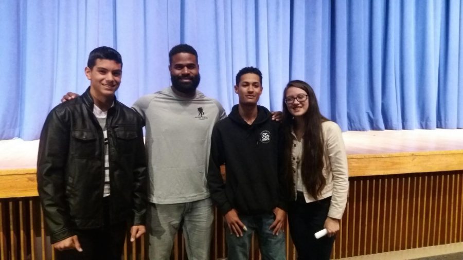Former NFL running back William Green(second from the left) stands with LHS FCA members (In order from left) Junior Dan Garcia, Junior Lucrecia Acosta, and Junior Damian Regalado.