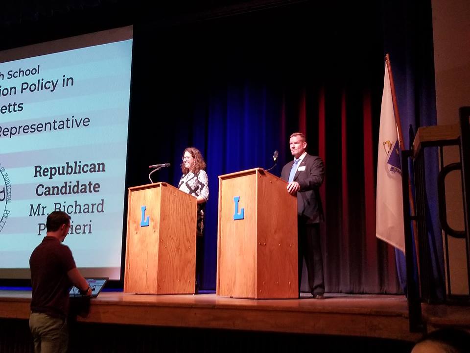 Natalie Higgins (left) debates Richard Palmieri (right) at LHS