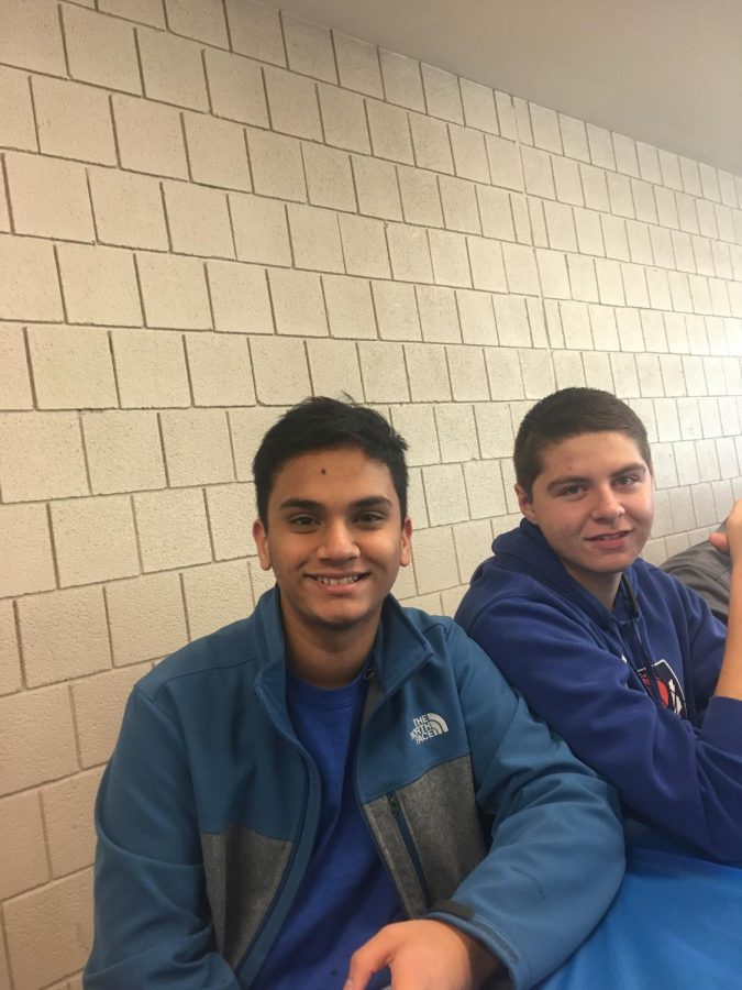 Ruchit Patel and Devin Allen sitting together at the breakfast.