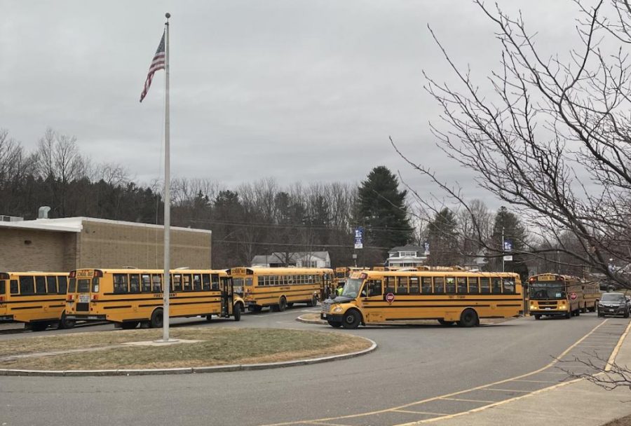 Busses line up early to bring students home. 