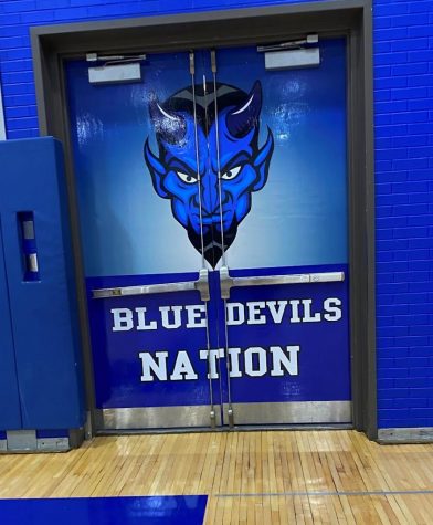 The Blue Devil logo on the gym doors was created by the students in CTEis Graphic Communications Department