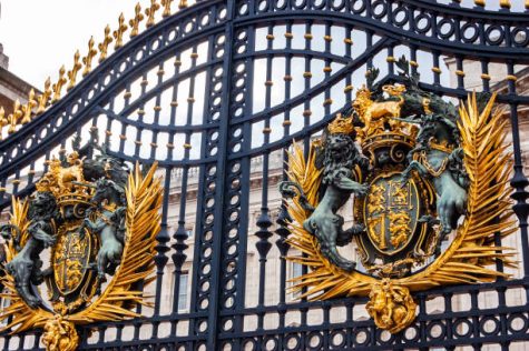 London, United Kingdom - September 14, 2017: Golden emblem of the Royal family on the gate of the Buckingham Palace
