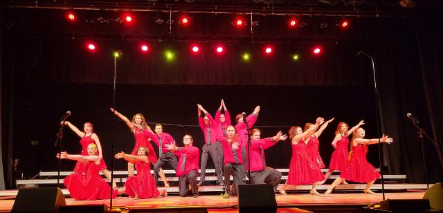 The LHS Ignition show choir strikes their final pose in Fire during their competition.