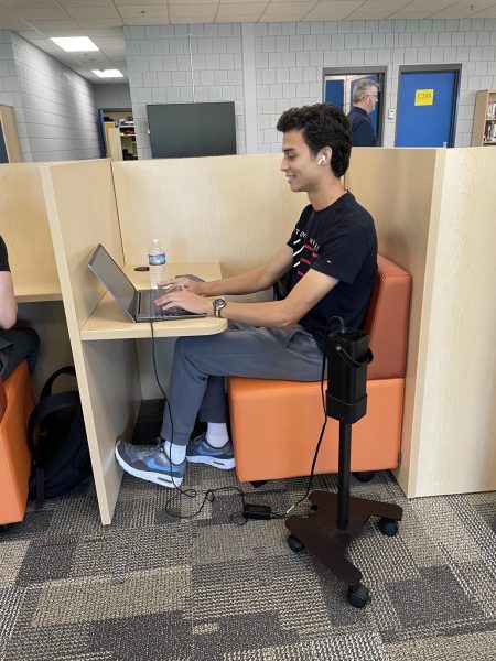 LHS Senior Nicholas Carboni sits in one of the new study cubicles in the media center.