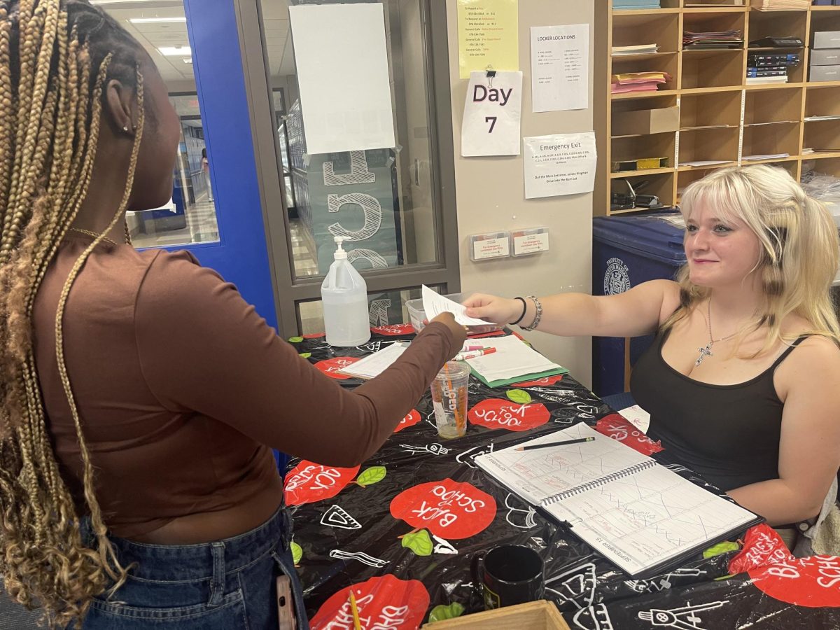 Guidance Student Worker LHS Senior Christian Joyce helps fellow senior Jenny Ansah in Guidance. 