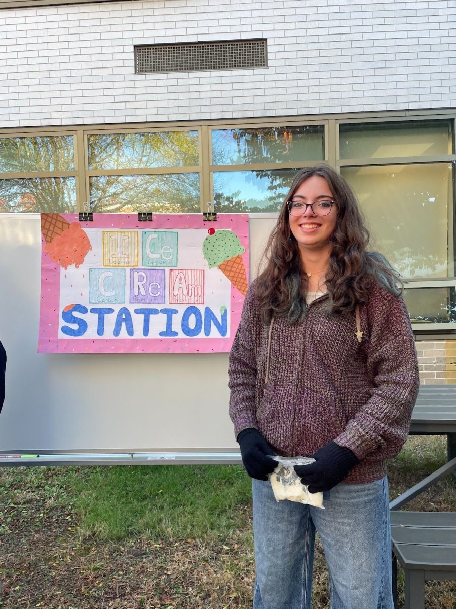 LHS Sophomore Hadley Cutting makes ice cream during Mole Day.