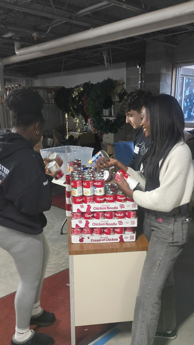 Students organize the donations at Ruth's food pantry last monh