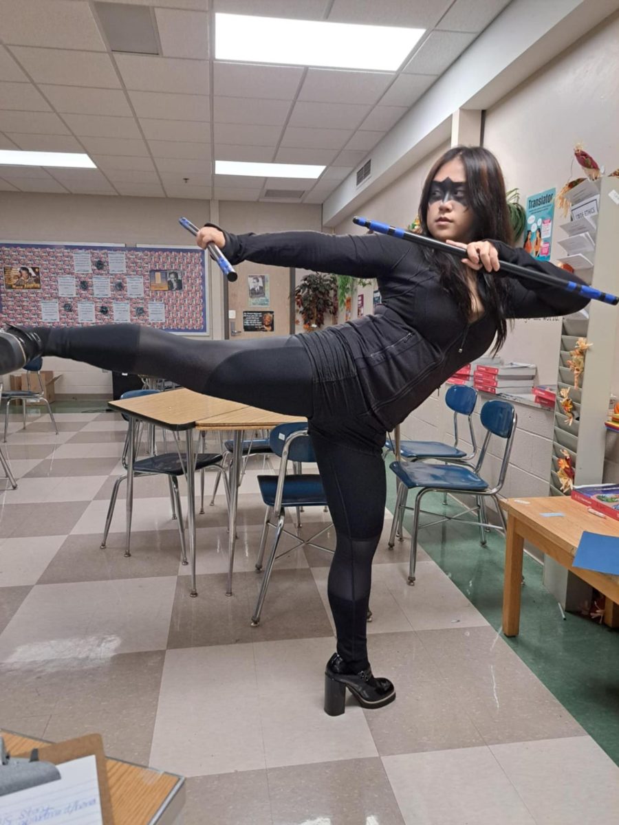 LHS Senior Jinna Do Strikes a Fighting Pose