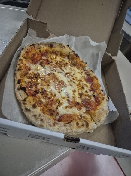 The cheese pizza from Appleseeds Restaurant at LHS CTEi  
