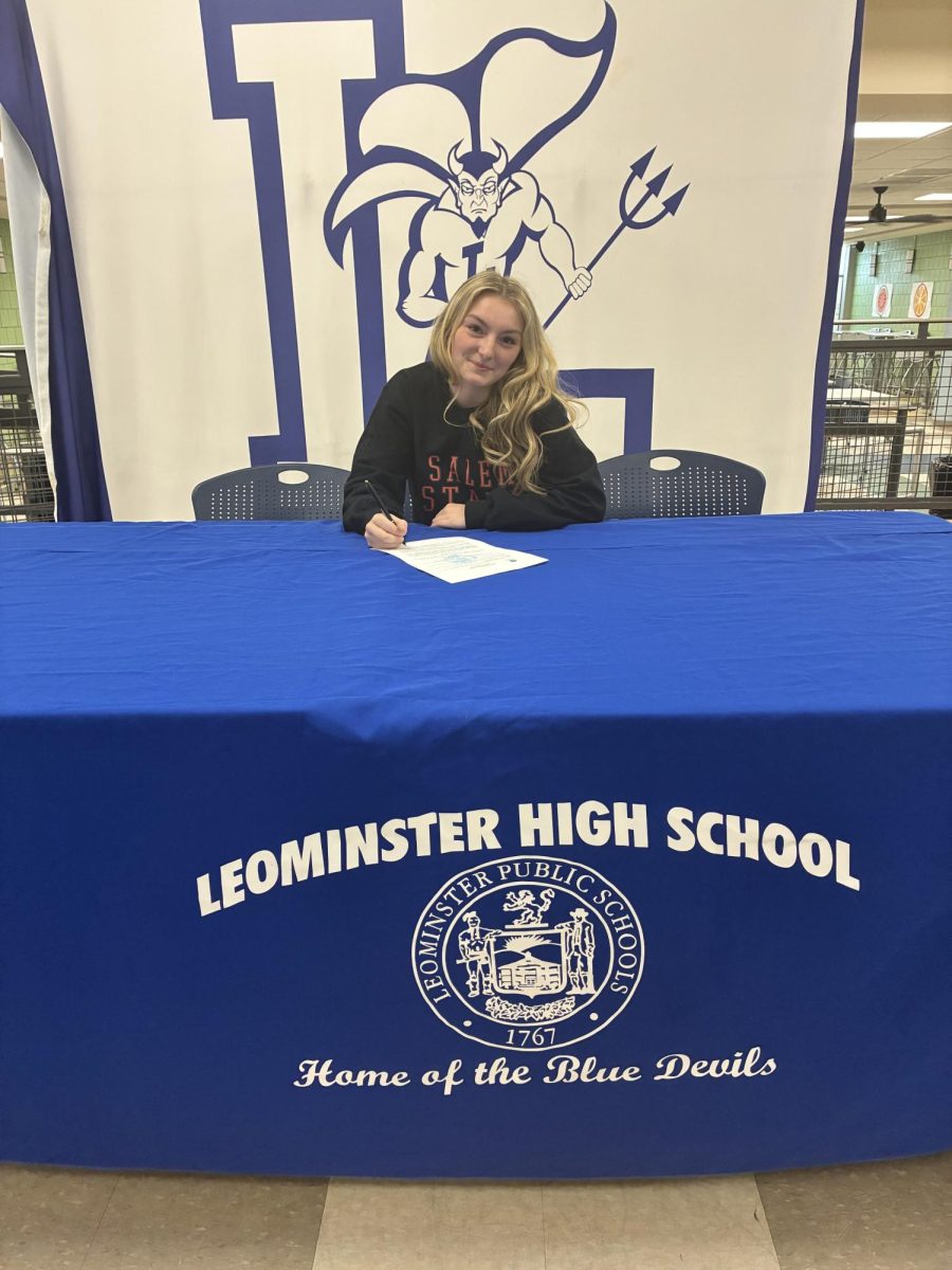 LHS Senior Soccer Player Sasha Sabourin signs a commitment letter with Salem State. 