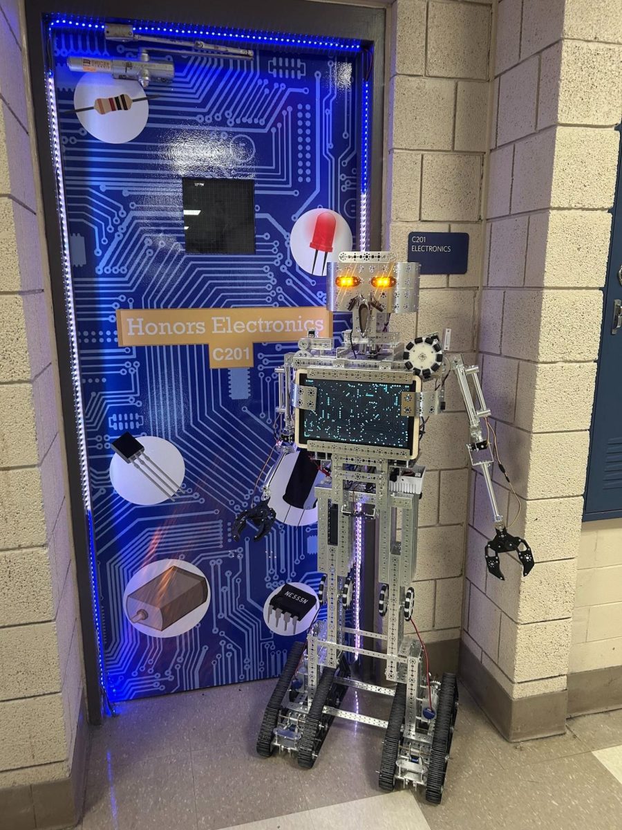 The latest Robotics Project. Mobility comes from a simple but effective design: a tank-like tracked chassis powered by motors. 
“It runs on a tractor, like a tank kind of track,” said Electronics teacher John Antonetti. “It sits on like a 12-inch long track of a motor with wheels.”
